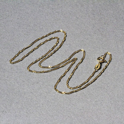 14k Yellow Gold Singapore Chain 1.5mm | Richard Cannon Jewelry