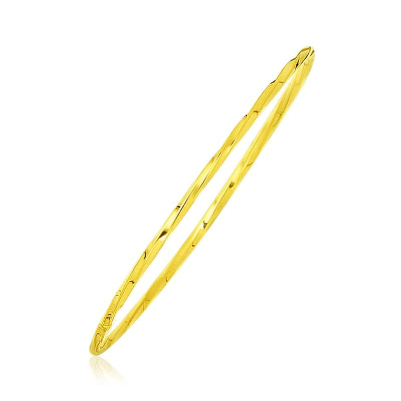 14k Yellow Gold Thin Twisted Shiny Bangle | Richard Cannon Jewelry