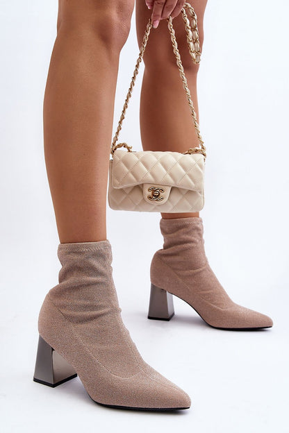 Heel boots Step in style