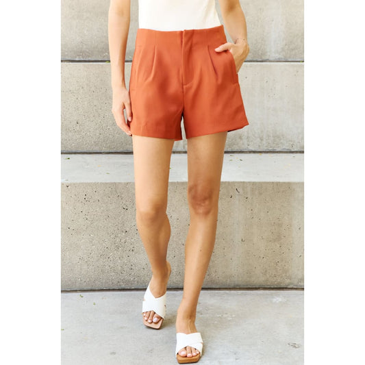 And The Why Every Little Thing Full Size Pleated High Waisted Shorts in Ochre | The Urban