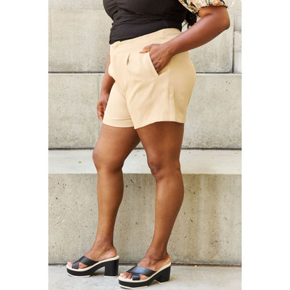 And The Why Every Little Thing Full Size Pleated High Waisted Shorts in Sand | The Urban
