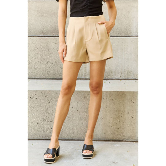 And The Why Every Little Thing Full Size Pleated High Waisted Shorts in Sand | The Urban